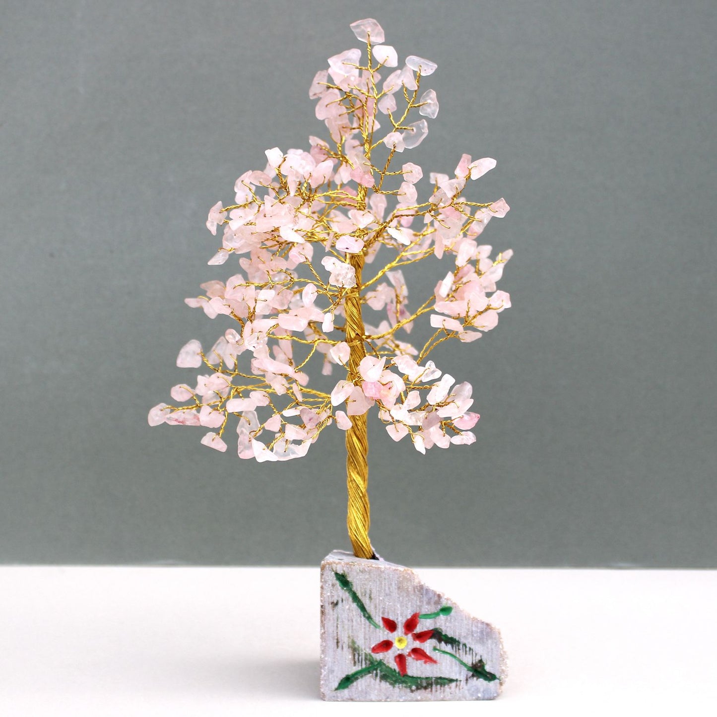Árbol de Cuarzo Rosa sobre Base de Piedra - 320 Gemas Naturales