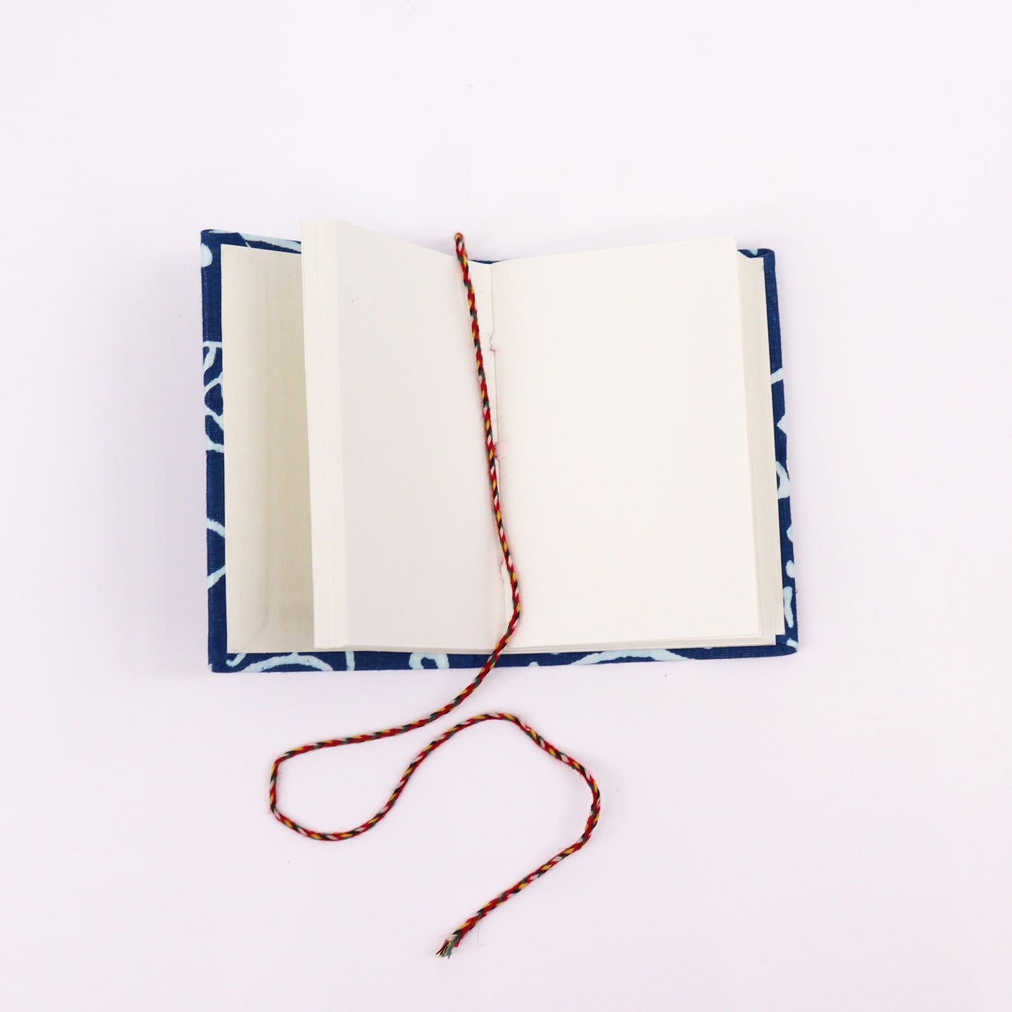 Set de 8 Cuadernos de algodón con estampado 7x10cm (display pack)